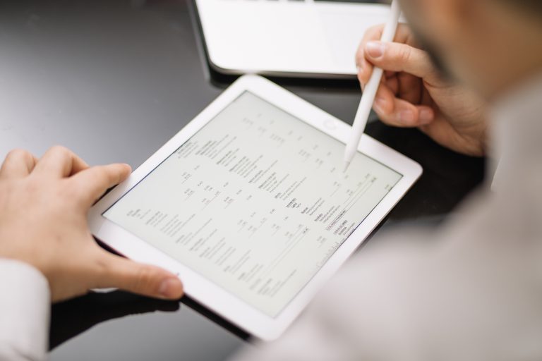 crop employee with tablet pencil Storage crop employee with tablet pencil Storage