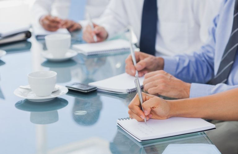 business people hands taking some notes Product Development business people hands taking some notes Product Development