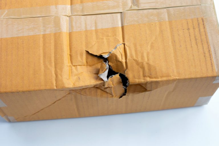damaged cardboard box with hole Quality Control damaged cardboard box with hole Quality Control