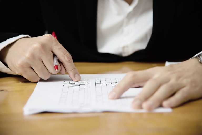 instructor checking multiple choices answer sheet exam education people working with paper test concept Shipping instructor checking multiple choices answer sheet exam education people working with paper test concept Shipping