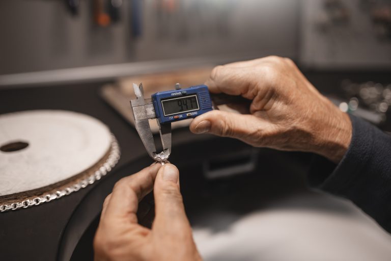 male jeweler working shop with measuring device Supplier Management
